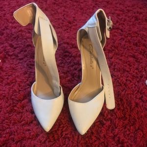 White ankle strap pumps